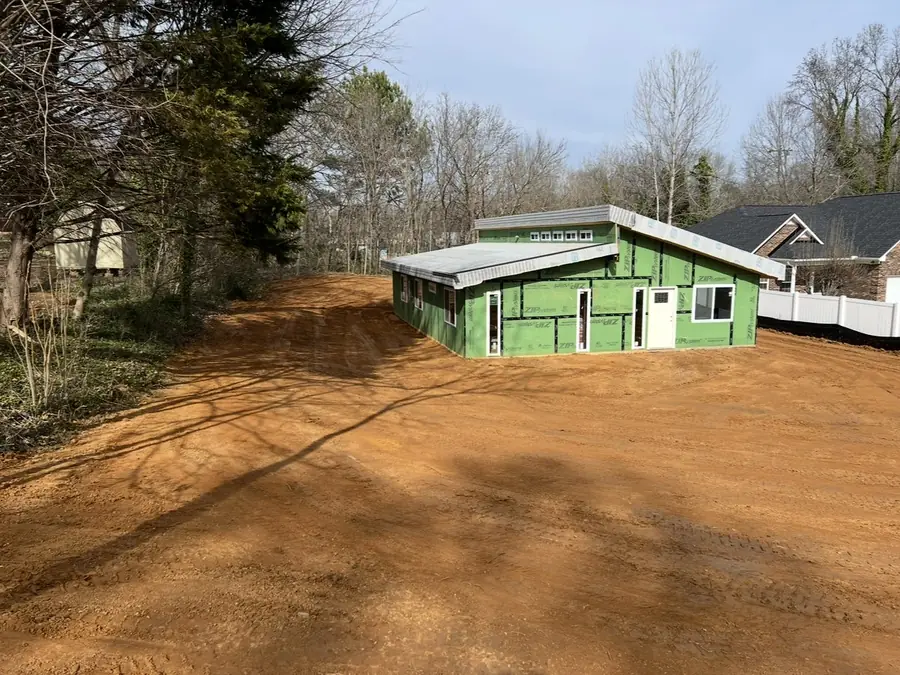 Bare graded yard around a house