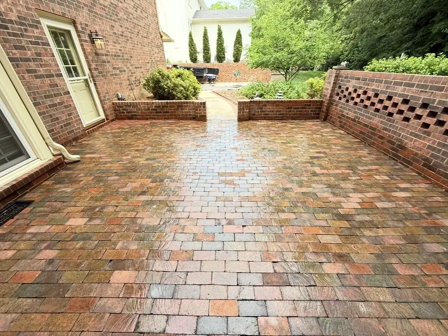 Clay paver courtyard on an older home