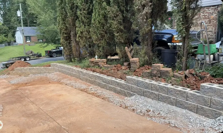 Low wall along a gravel drive