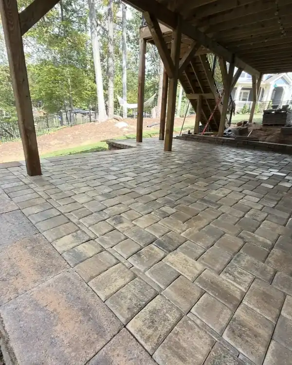 Paver patio under a deck