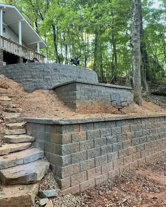 Two-level block wall with stone steps