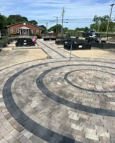 Round paver patio with dark rings